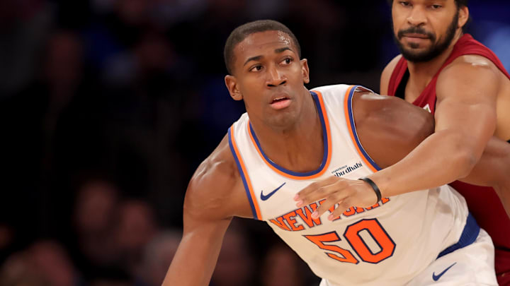 Oct 22, 2025; New York, New York, USA; New York Knicks forward Trey Jemison III (50) controls the ball against Cleveland Cavaliers center Jarrett Allen (31) during the first quarter at Madison Square Garden. Mandatory Credit: Brad Penner-Imagn Images