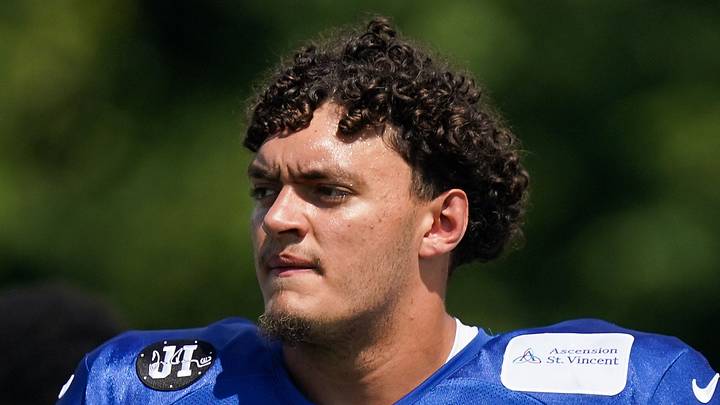 Indianapolis Colts offensive tackle Jalen Travis walks up the field