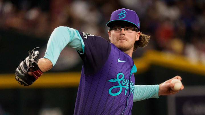 Aug 8, 2025; Phoenix, Arizona, USA; Arizona Diamondbacks pitcher Andrew Saalfrank (27) pitches in the eighth inning against the Colorado Rockies at Chase Field. Mandatory Credit: Allan Henry-Imagn Images