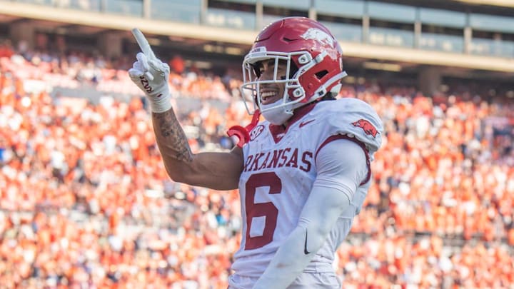 Arkansas Razorbacks wide receiver Isaiah Sategna (6) celebrates his touchdown catch as Auburn Tigers take on Arkansas Razorbacks at Jordan-Hare Stadium in Auburn, Ala.