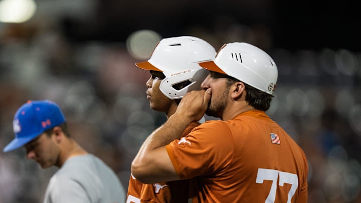Texas outfielder Jonah Williams (55) listens to instructions from a coach during the Longhorns' game against Houston Christian, April 8, 2025 at UFCU Disch-Falk Field in Austin.