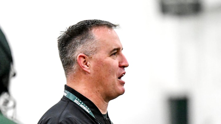 Michigan State's head coach Pat Fitzgerald instructs players during spring football practice on Tuesday, March 24, 2026, in East Lansing.