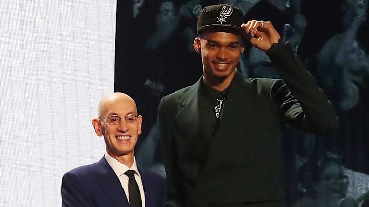 Jun 22, 2023; Brooklyn, NY, USA; Victor Wembanyama poses for photos with NBA commissioner Adam Silver after being selected first by the San Antonio Spurs in the first round of the 2023 NBA Draft at Barclays Arena. Mandatory Credit: Wendell Cruz-Imagn Images