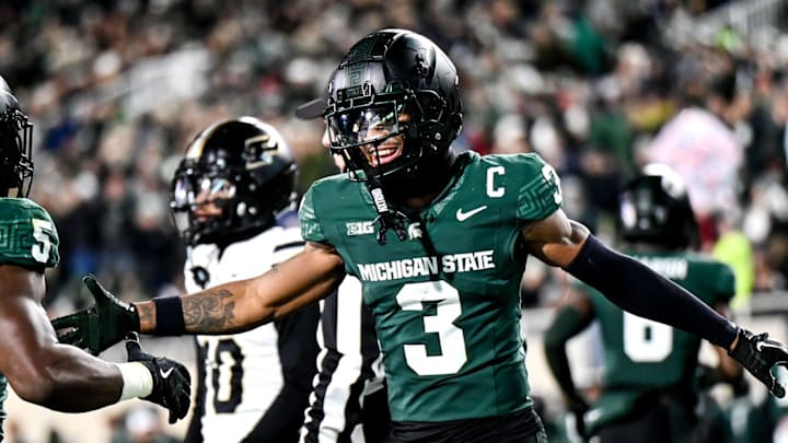 Michigan State's Montorie Foster Jr., right, celebrates with Nathan Carter, left, after Carter's touchdown against Purdue during the second quarter on Friday, Nov. 22, 2024, at Spartan Stadium in East Lansing.