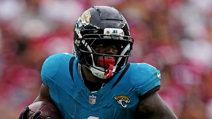 Sep 28, 2025; Santa Clara, California, USA; Jacksonville Jaguars running back Travis Etienne Jr. (1) runs the ball during the second half against the San Francisco 49ers at Levi's Stadium. Mandatory Credit: Kyle Terada-Imagn Images Sep 28, 2025; Santa Clara, California, USA; Jacksonville Jaguars running back Travis Etienne Jr. (1) runs the ball during the second half against the San Francisco 49ers at Levi's Stadium. Mandatory Credit: Kyle Terada-Imagn Images