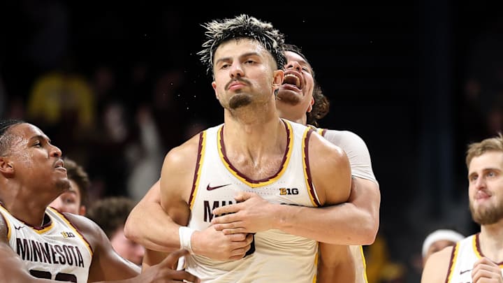 Jan 16, 2025; Minneapolis, Minnesota, USA; Minnesota Golden Gophers forward Dawson Garcia (3) celebrates his game winning three-point basket against the Michigan Wolverines after the game at Williams Arena. Mandatory Credit: Matt Krohn-Imagn Images