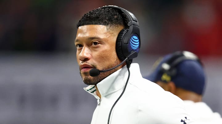 Notre Dame coach Marcus Freeman looks on from the sidelines during the National Championship game. Notre Dame coach Marcus Freeman looks on from the sidelines during the National Championship game.