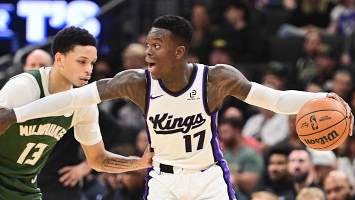 Nov 1, 2025; Milwaukee, Wisconsin, USA; Sacramento Kings guard Dennis Schroder (17) controls the ball against Milwaukee Bucks guard Ryan Rollins (13) in the first quarter at Fiserv Forum. Mandatory Credit: Benny Sieu-Imagn Images