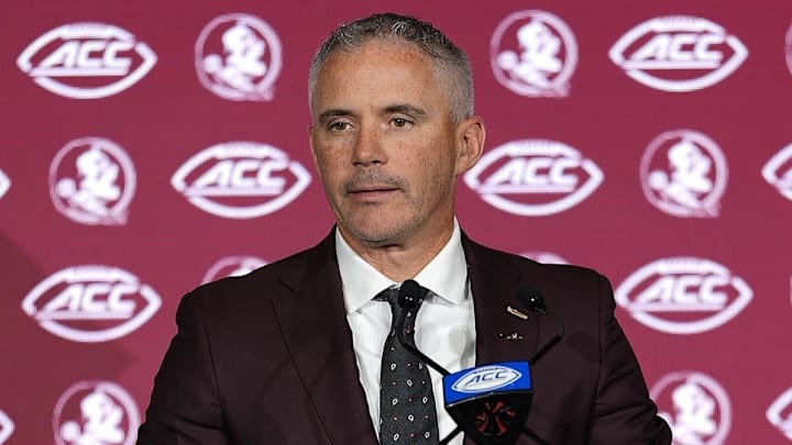 Jul 23, 2025; Charlotte, NC, USA; Florida State head coach Mike Norvell answers questions from the media during ACC Media days at Hilton Charlotte Uptown. Mandatory Credit: Jim Dedmon-Imagn Images