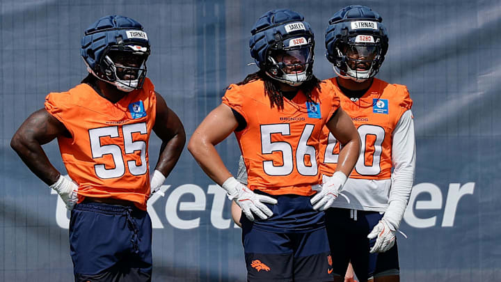 Jul 24, 2025; Englewood, CO, USA; Denver Broncos linebacker Jordan Turner (55) and linebacker Levelle Bailey (56) and linebacker Justin Strnad (40) during Denver Broncos Training Camp. Mandatory Credit: Isaiah J. Downing-Imagn Images