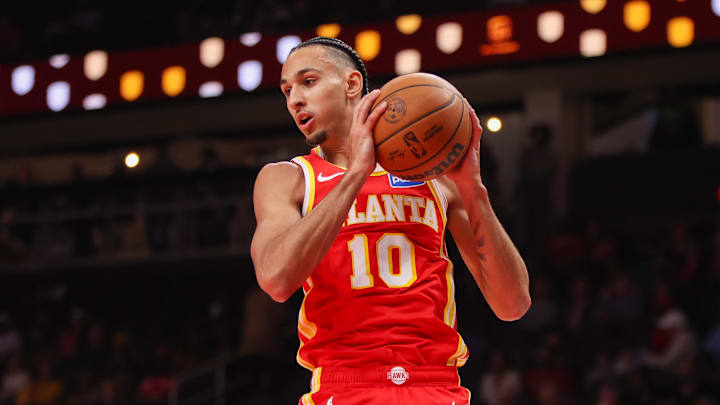 Atlanta Hawks forward Zaccharie Risacher (10) grabs a rebound against the Milwaukee Bucks in the first quarter at State Farm Arena on March 14, 2026