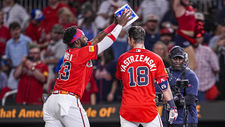 May 15, 2026; Cumberland, Georgia, USA; Atlanta Braves left fielder Mike Yastrzemski (18) reacts with teammates after hitting a walk off double to drive in the winning run against the Boston Red Sox during the tenth inning at Truist Park. Mandatory Credit: Dale Zanine-Imagn Images