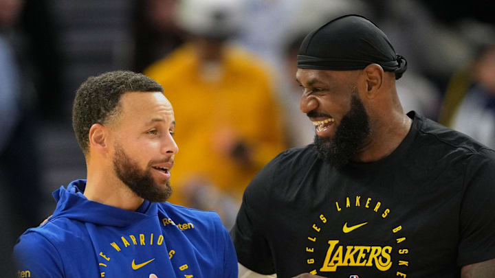 Dec 25, 2024; San Francisco, California, USA; Golden State Warriors guard Stephen Curry (left) and Los Angeles Lakers forward LeBron James (right) talk before the game at Chase Center. Mandatory Credit: Darren Yamashita-Imagn Images Dec 25, 2024; San Francisco, California, USA; Golden State Warriors guard Stephen Curry (left) and Los Angeles Lakers forward LeBron James (right) talk before the game at Chase Center. Mandatory Credit: Darren Yamashita-Imagn Images