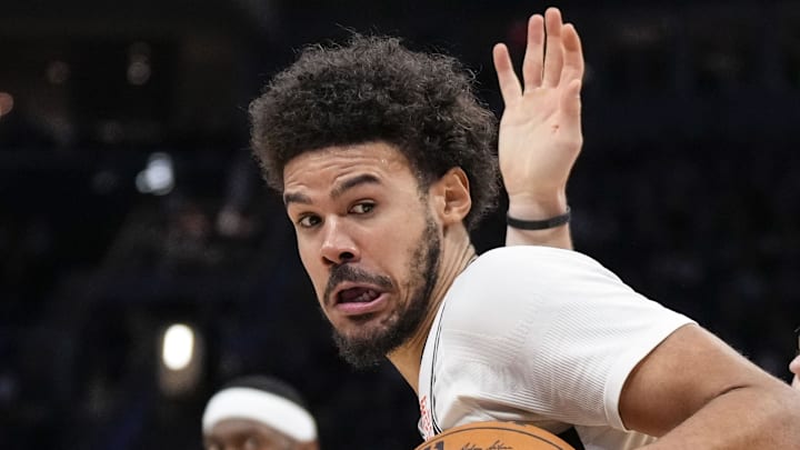 Dec 26, 2024; Milwaukee, Wisconsin, USA;  Brooklyn Nets forward Cameron Johnson (2) spins towards the basket around Milwaukee Bucks guard AJ Green (20) during the fourth quarter at Fiserv Forum. Mandatory Credit: Jeff Hanisch-Imagn Images