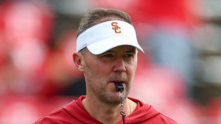 Sep 19, 2026; Piscataway, New Jersey, USA; USC Trojans head coach Lincoln Riley on the field during warm ups before the game against the Rutgers Scarlet Knights at SHI Stadium. Mandatory Credit: Vincent Carchietta-Imagn Images Sep 19, 2026; Piscataway, New Jersey, USA; USC Trojans head coach Lincoln Riley on the field during warm ups before the game against the Rutgers Scarlet Knights at SHI Stadium. Mandatory Credit: Vincent Carchietta-Imagn Images