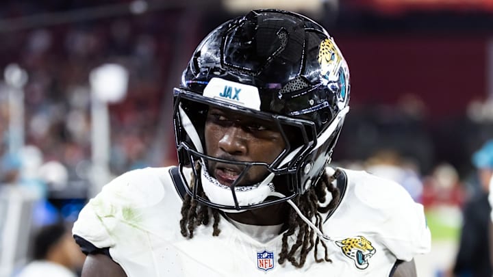 Nov 23, 2025; Glendale, Arizona, USA; Jacksonville Jaguars linebacker Devin Lloyd (0) against the Arizona Cardinals at State Farm Stadium. Mandatory Credit: Mark J. Rebilas-Imagn Images