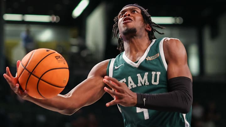 Dec 28, 2025; Atlanta, Georgia, USA; Florida A&M Rattlers guard Anquan Boldin Jr. (4) shoots against the Georgia Tech Yellow Jackets in the first half at McCamish Pavilion. Mandatory Credit: Brett Davis-Imagn Images
