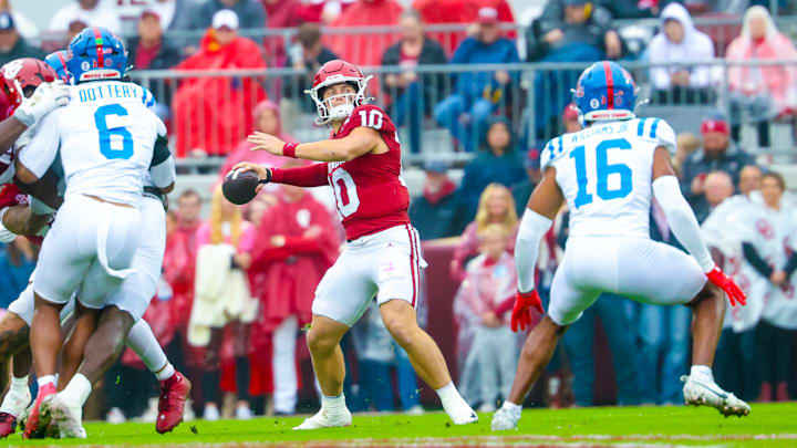 Oklahoma quarterback John Mateer drops back to pass against Ole Miss. Oklahoma quarterback John Mateer drops back to pass against Ole Miss.