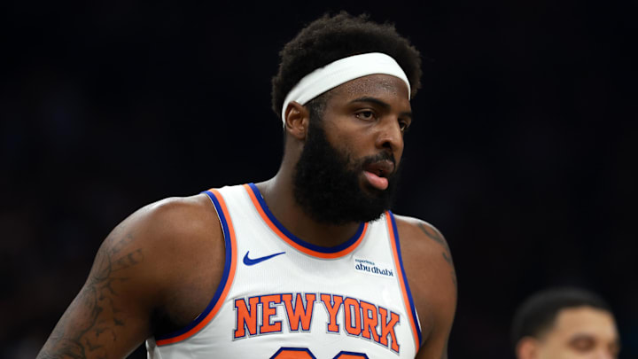 Jan 9, 2026; Phoenix, Arizona, USA; New York Knicks center Mitchell Robinson (23) against the Phoenix Suns at Mortgage Matchup Center. Mandatory Credit: Mark J. Rebilas-Imagn Images
