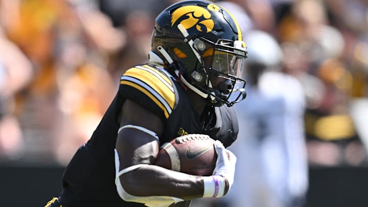 Sep 2, 2023; Iowa City, Iowa, USA; Iowa Hawkeyes running back Kaleb Johnson (2) runs the ball against the Utah State Aggies during the second quarter at Kinnick Stadium. Mandatory Credit: Jeffrey Becker-Imagn Images Sep 2, 2023; Iowa City, Iowa, USA; Iowa Hawkeyes running back Kaleb Johnson (2) runs the ball against the Utah State Aggies during the second quarter at Kinnick Stadium. Mandatory Credit: Jeffrey Becker-Imagn Images