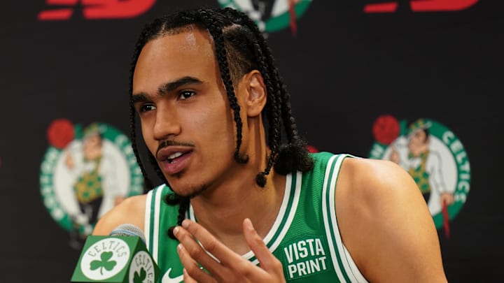 Oct 2, 2023; Boston, Celtics, USA; Boston Celtics guard Dalano Banton (45) talks with sports media during Boston Celtics Media Day. Mandatory Credit: David Butler II-Imagn Images