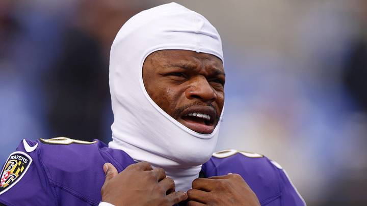 Baltimore Ravens quarterback Lamar Jackson looks on during warmups