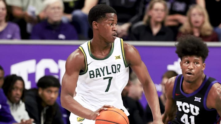 Mar 4, 2025; Fort Worth, Texas, USA; Baylor Bears guard VJ Edgecombe (7) controls the ball as TCU Horned Frogs guard Jace Posey (41) defends during the first half at Ed and Rae Schollmaier Arena. Mandatory Credit: Kevin Jairaj-Imagn Images Mar 4, 2025; Fort Worth, Texas, USA; Baylor Bears guard VJ Edgecombe (7) controls the ball as TCU Horned Frogs guard Jace Posey (41) defends during the first half at Ed and Rae Schollmaier Arena. Mandatory Credit: Kevin Jairaj-Imagn Images