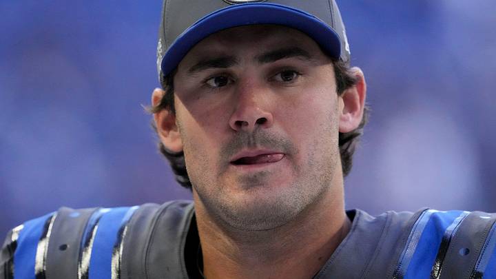 Indianapolis Colts quarterback Daniel Jones walks off the field