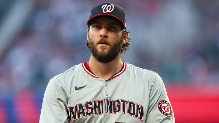 May 30, 2024; Atlanta, Georgia, USA; Washington Nationals starting pitcher Trevor Williams (32) walks off the field against the Atlanta Braves in the third inning at Truist Park