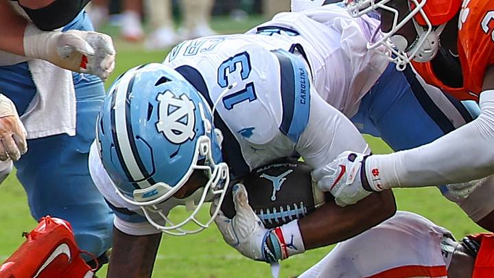 Sep 19, 2026; Clemson, South Carolina, USA; University of North Carolina Tar Heels receiver Jordan Shipp (1) dives for extra yards against Clemson Tigers at Memorial Stadium. Jordon is wearing number 13 in honor of University of North Carolina Tar Heels Tylee Craft. Mandatory Credit: Ashley Tumlin-Imagn Images Sep 19, 2026; Clemson, South Carolina, USA; University of North Carolina Tar Heels receiver Jordan Shipp (1) dives for extra yards against Clemson Tigers at Memorial Stadium. Jordon is wearing number 13 in honor of University of North Carolina Tar Heels Tylee Craft. Mandatory Credit: Ashley Tumlin-Imagn Images