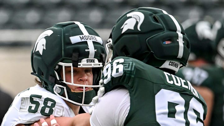 Michigan State's Conner Moore, left, blocks Eli Coenen during the football Spring Showcase on Saturday, April 18, 2026, at Spartan Stadium in East Lansing.