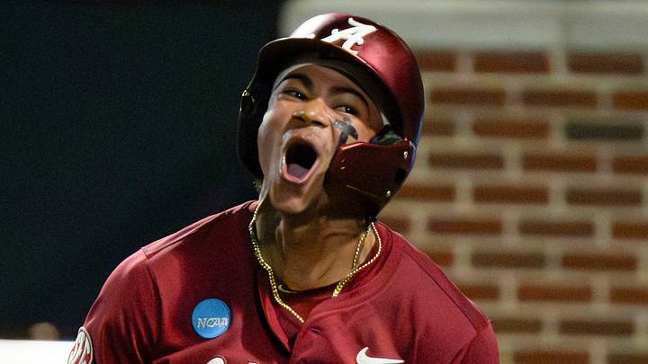 Alabama batter Justin Lebron (1) celebrates his solo homer Alabama batter Justin Lebron (1) celebrates his solo homer