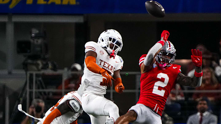 Jahdae Barron of Texas breaks up a pass to Ohio State receiver Emeka Egbuka in the national semifinals. Jahdae Barron of Texas breaks up a pass to Ohio State receiver Emeka Egbuka in the national semifinals.