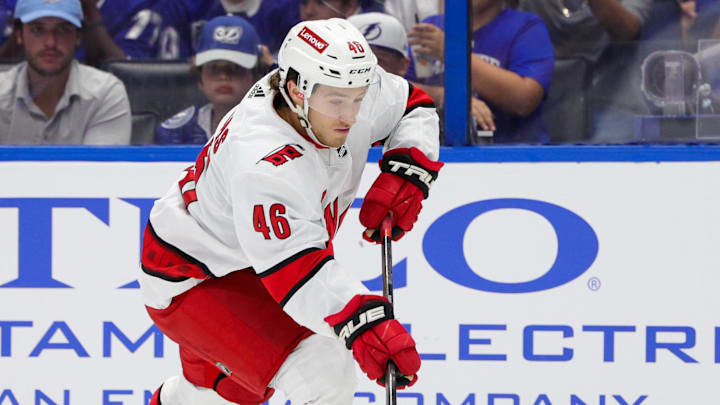 Sep 29, 2023; Tampa, Florida, USA; Carolina Hurricanes center Justin Robidas (46) controls the puck against the Tampa Bay Lightning in the second period during preseason at Amalie Arena. Mandatory Credit: Nathan Ray Seebeck-Imagn Images Sep 29, 2023; Tampa, Florida, USA; Carolina Hurricanes center Justin Robidas (46) controls the puck against the Tampa Bay Lightning in the second period during preseason at Amalie Arena. Mandatory Credit: Nathan Ray Seebeck-Imagn Images