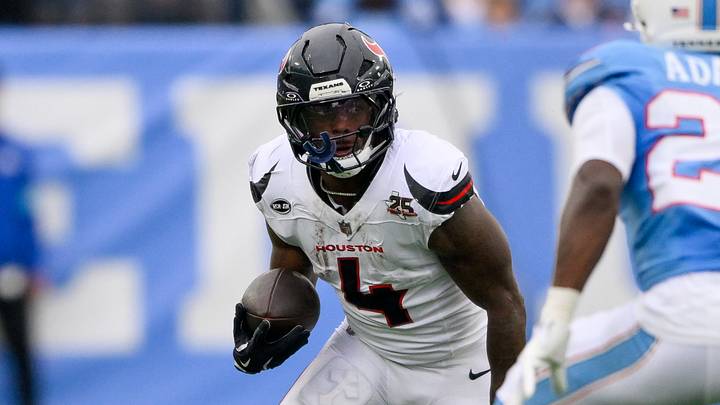 Oct 11, 2026; Nashville, Tennessee, USA; Houston Texans running back Woody Marks (4) runs with the ball against the Tennessee Titans during the first half at Nissan Stadium. Mandatory Credit: Steve Roberts-Imagn Images Oct 11, 2026; Nashville, Tennessee, USA; Houston Texans running back Woody Marks (4) runs with the ball against the Tennessee Titans during the first half at Nissan Stadium. Mandatory Credit: Steve Roberts-Imagn Images