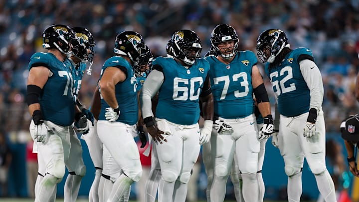 Aug 17, 2024; Jacksonville, Florida, USA; Jacksonville Jaguars center Darryl Williams (60) guard Blake Hance (73) and offensive tackle Javon Foster (62) line up against the Tampa Bay Buccaneers in the third quarter during a preseason game at EverBank Stadium. Mandatory Credit: Nathan Ray Seebeck-Imagn Images