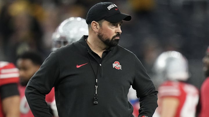 Dec 29, 2023; Arlington, Texas, USA; Ohio State Buckeyes head coach Ryan Day leads warm-ups prior to the Goodyear Cotton Bowl Classic against the Missouri Tigers at AT&T Stadium.