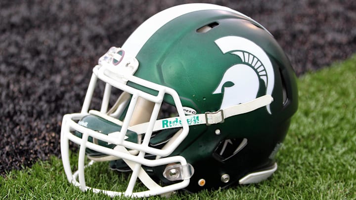 Sep 4, 2015; Kalamazoo, MI, USA; General view of Michigan State Spartans helmet on field prior to a game against Western Michigan at Waldo Stadium.