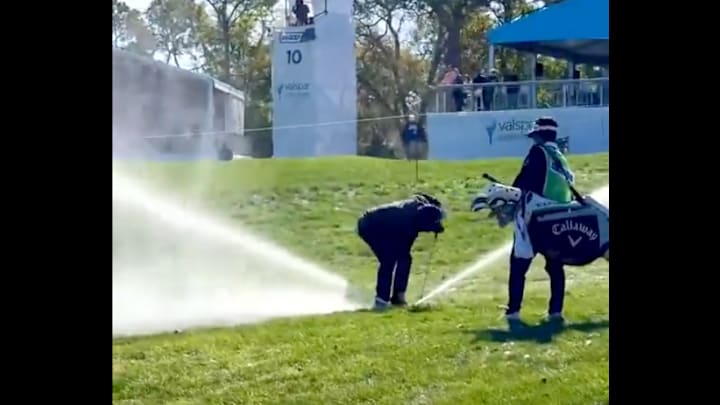 Adam Hadwin hits a sprinkler and immediately regrets his decision.