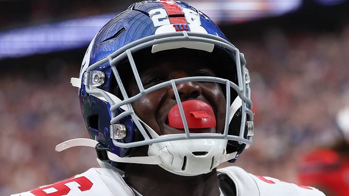 Oct 25, 2026; Houston, Texas, USA;  New York Giants running back Devin Singletary (26) reacts after he scores the game winning touchdown in overtime against the Houston Texans at Reliant Stadium.  Mandatory Credit: Thomas Shea-Imagn Images