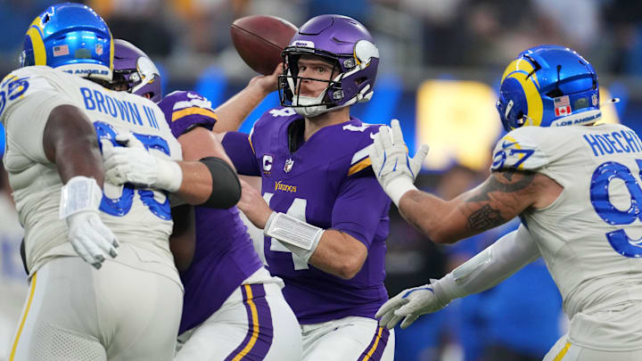 Oct 24, 2024; Inglewood, California, USA; Minnesota Vikings quarterback Sam Darnold (14) throws the ball against the Los Angeles Rams in the first half at SoFi Stadium. Mandatory Credit: Kirby Lee-Imagn Images