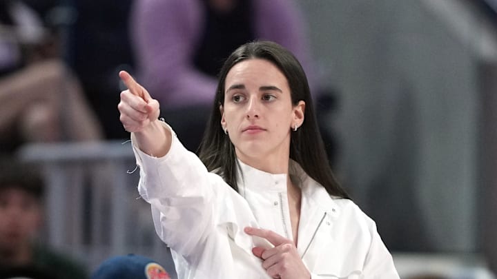 Aug 31, 2025; San Francisco, California, USA; Indiana Fever guard Caitlin Clark (center) gestures after an offensive foul by Golden State Valkyries guard Veronica Burton (foreground right) during the third quarter at Chase Center. Mandatory Credit: Darren Yamashita-Imagn Images Aug 31, 2025; San Francisco, California, USA; Indiana Fever guard Caitlin Clark (center) gestures after an offensive foul by Golden State Valkyries guard Veronica Burton (foreground right) during the third quarter at Chase Center. Mandatory Credit: Darren Yamashita-Imagn Images