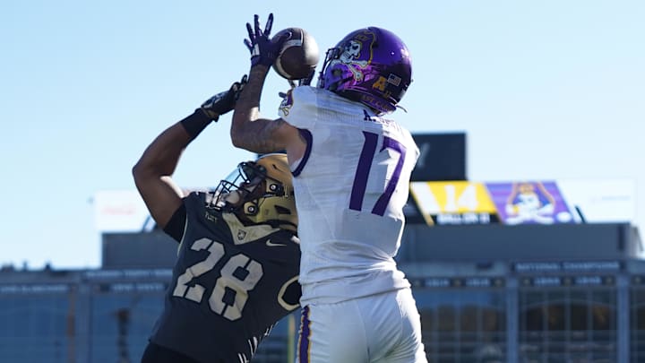 Oct 19, 2024; West Point, New York, USA; East Carolina Pirates wide receiver Anthony Smith (17) makes a touchdown catch over Army Black Knights cornerback Donavon Platt (28) during the second half at Michie Stadium. Mandatory Credit: Lucas Boland-Imagn Images Oct 19, 2024; West Point, New York, USA; East Carolina Pirates wide receiver Anthony Smith (17) makes a touchdown catch over Army Black Knights cornerback Donavon Platt (28) during the second half at Michie Stadium. Mandatory Credit: Lucas Boland-Imagn Images