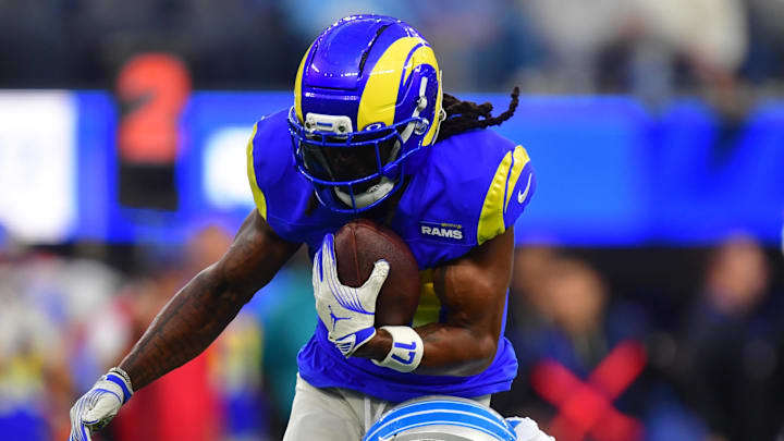 Dec 14, 2025; Inglewood, California, USA; Los Angeles Rams wide receiver Davante Adams (17) runs after a catch against Detroit Lions safety Daniel Thomas (2) during the third quarter at SoFi Stadium. Mandatory Credit: Gary A. Vasquez-Imagn Images Dec 14, 2025; Inglewood, California, USA; Los Angeles Rams wide receiver Davante Adams (17) runs after a catch against Detroit Lions safety Daniel Thomas (2) during the third quarter at SoFi Stadium. Mandatory Credit: Gary A. Vasquez-Imagn Images