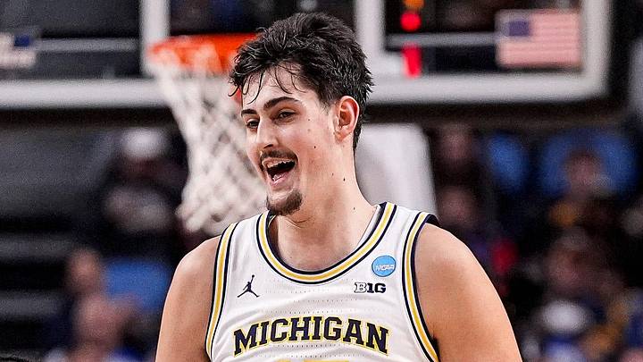 Michigan center Aday Mara (15), center, celebrates a play against Saint Louis with guard Elliot Cadeau (3) during the first half of NCAA Tournament Second Round at KeyBank Center in Buffalo on Saturday, March 21, 2026.