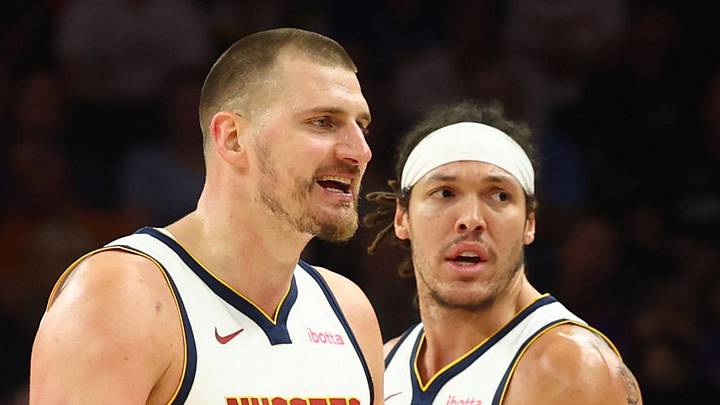 Mar 24, 2026; Phoenix, Arizona, USA; Denver Nuggets center Nikola Jokic (15) and forward Aaron Gordon (32) against the Phoenix Suns at Mortgage Matchup Center. Mandatory Credit: Mark J. Rebilas-Imagn Images