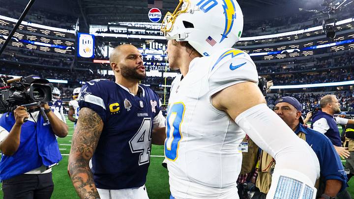 Dallas Cowboys QB Dak Prescott and Los Angeles Chargers QB Justin Herbert greet each other following a Chargers victory. Dallas Cowboys QB Dak Prescott and Los Angeles Chargers QB Justin Herbert greet each other following a Chargers victory.