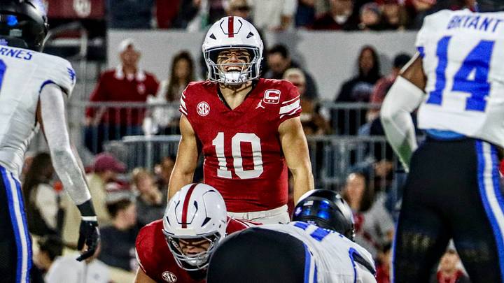 Oklahoma quarterback John Mateer scans the defense before a snap against Kentucky. Oklahoma quarterback John Mateer scans the defense before a snap against Kentucky.