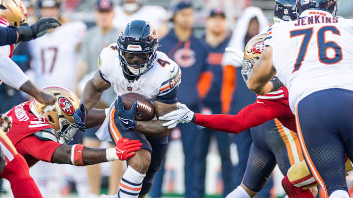 D'Andre Swift cuts toward an opening in Sunday's 38-13 Bears loss at San Francisco. Swift was listed as unable to practice Thursday.