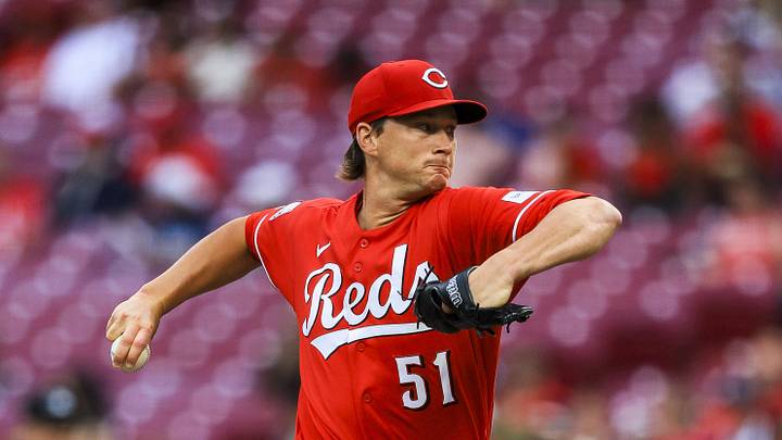 Jun 22, 2026; Cincinnati, Ohio, USA; Cincinnati Reds starting pitcher Brady Singer (51) pitches against the Milwaukee Brewers in the first inning at Great American Ball Park. Mandatory Credit: Katie Stratman-Imagn Images
